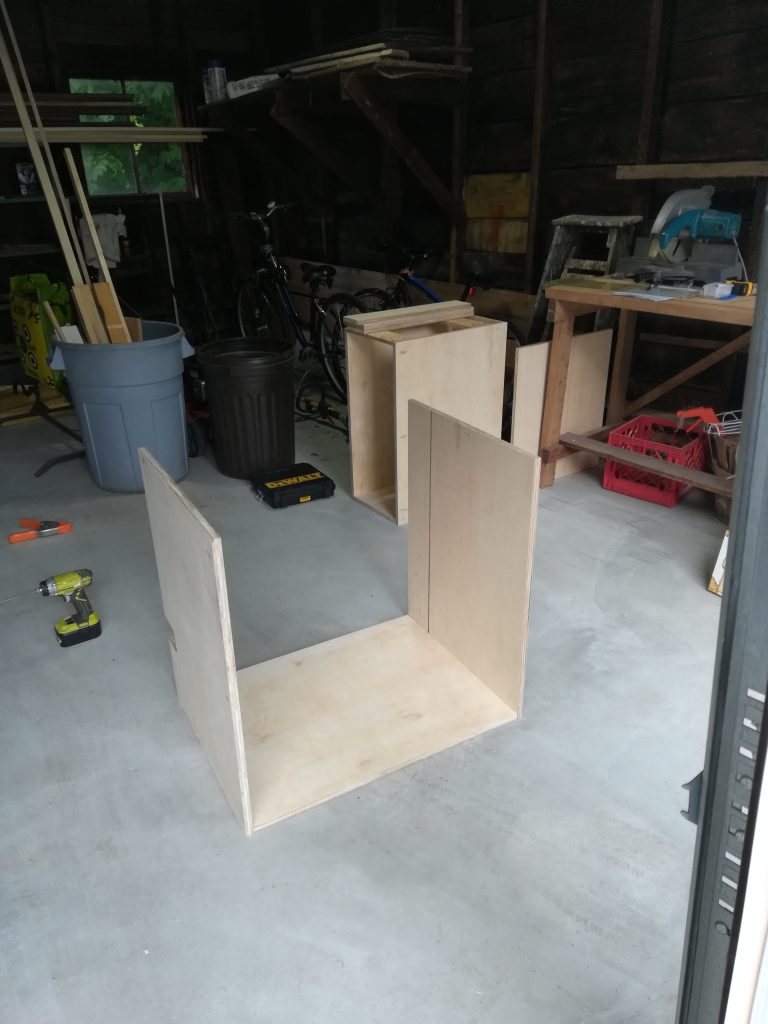 Cabinet box construction: sides attached to bottom