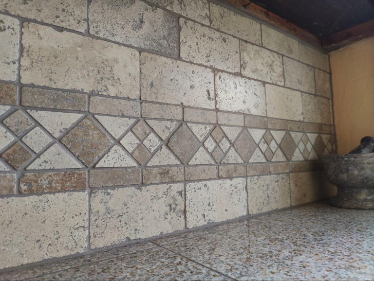 Our DIY tile backsplash using gorgeous travertine!