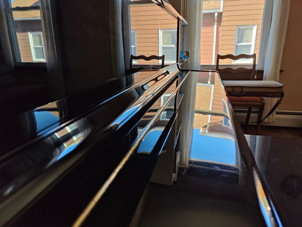 piano after cleaning with white green cloth