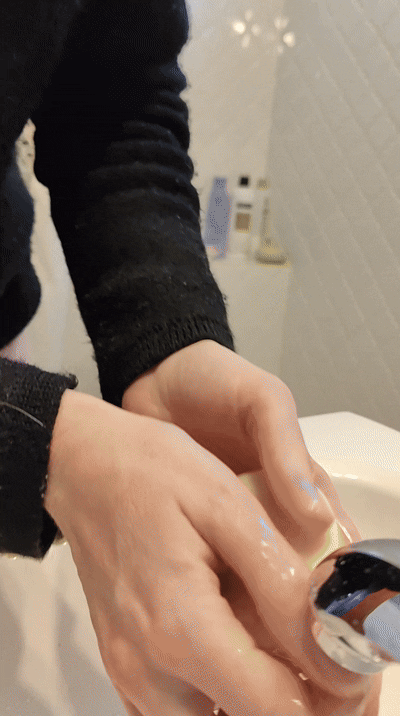 gif of washing hands with homemade soap bar, lots of lather