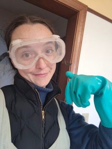 author wearing safety gear for making soap